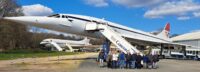 The OAS group posing in front of the Concorde at Brooklands Museum